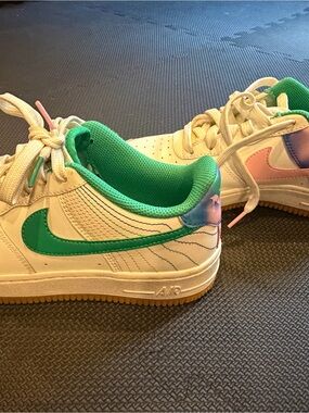Nike Kids Sneakers with Green Swoosh and Pink Heel Accent